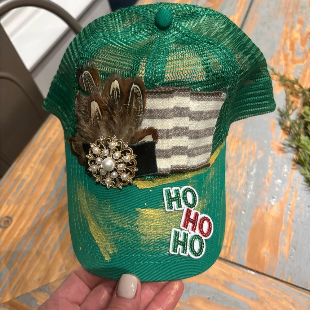 Festive Cap with Feather and Jewel Accent